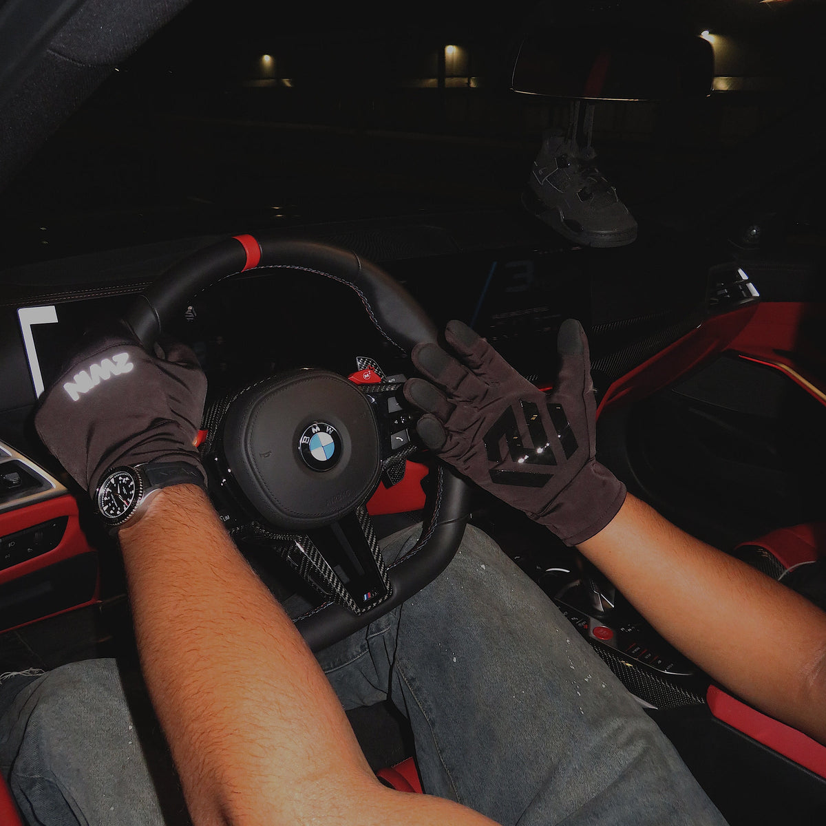 2WIN Driving Gloves worn on the wheel — glossy silicone palm print