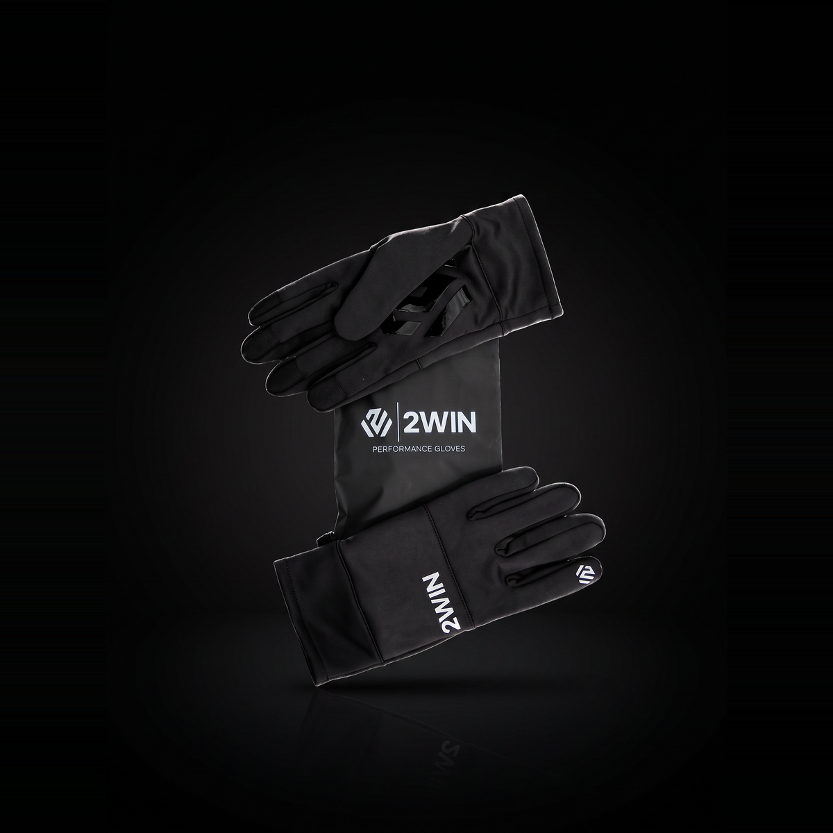 2WIN Driving Gloves and branded pouch on a black studio background