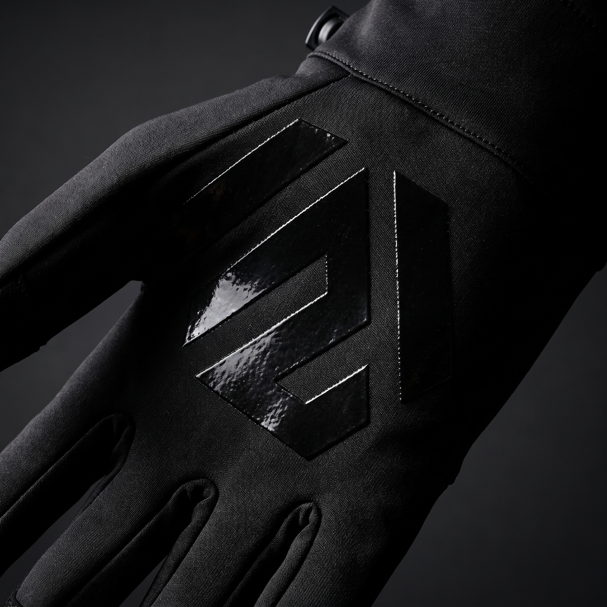 2WIN glove palm macro — glossy silicone hexagon grip, correct orientation